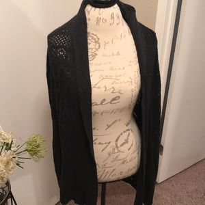 Mid lengths long sleeve knit black sweater. 1X